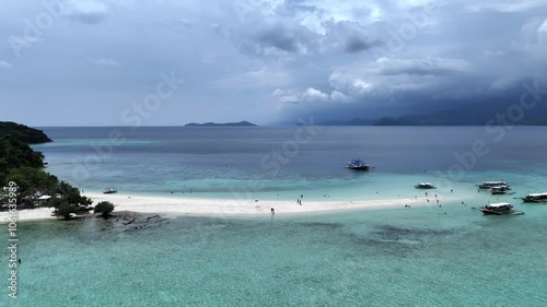 Aerial View of Sandy Spit with Boats on a Remote Philippine Island — Crystal Clear Waters and Stunning Scenery in High-Resolution Drone Footage