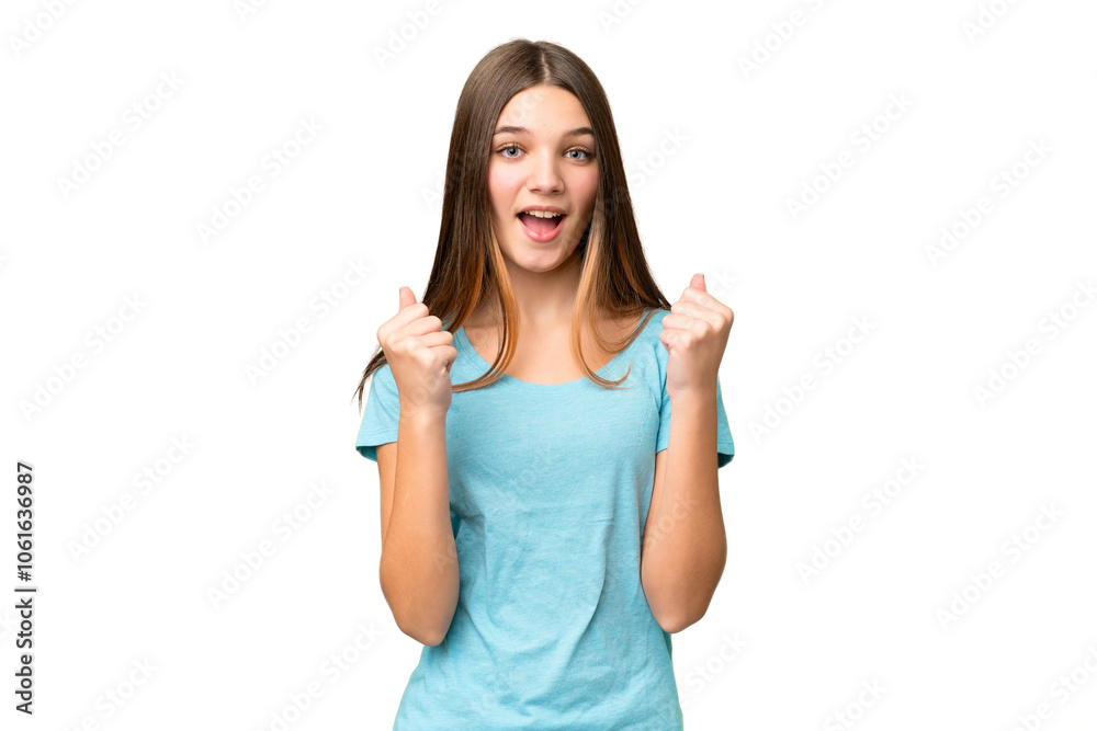Teenager girl over isolated chroma key background celebrating a victory in winner position Teenager girl over isolated chroma key background celebrating a victory in winner position