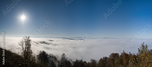 Panorama of the sea of ​​fog on the Uetliberg with blue sky in autumn photo