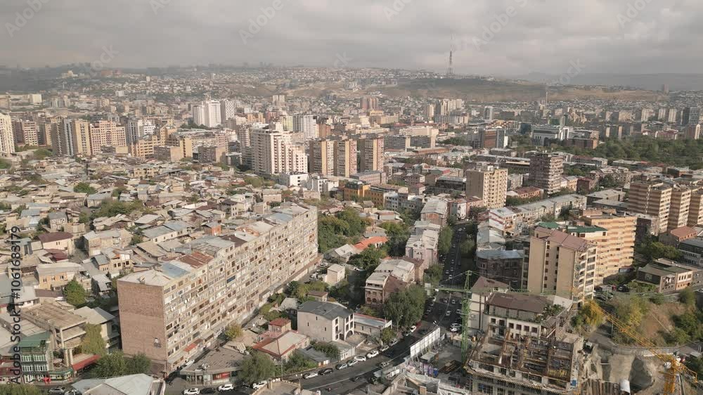 Yerevan, Armenia - 17th october, 2024: aerial static view sunny Armenia capital city Yerevan apartment buildings. Urban landscape panorama post soviet union countries architecture concept Yerevan, Armenia - 17th october, 2024: aerial static view sunny Armenia capital city Yerevan apartment buildings. Urban landscape panorama post soviet union countries architecture concept