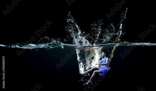 Professional woman swimmer on a wave