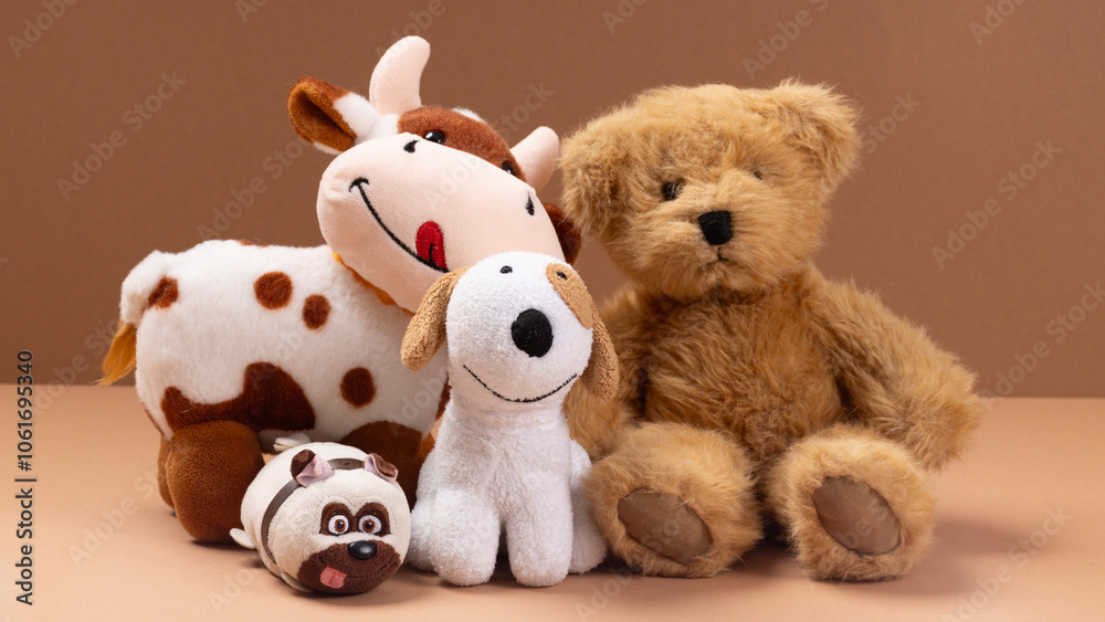 Soft toys on beige background concept of friends Soft toys on beige background concept of friends