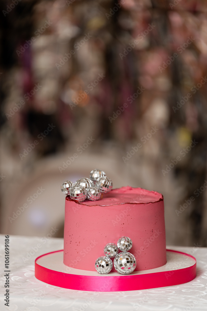 Pink birthday cake with silver balls