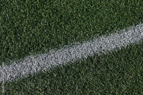 A close-up of a sideline on a synthetic football pitch photo