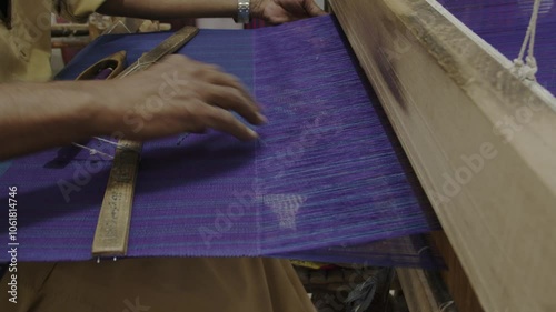 Traditional weaving technique in an old and colourful weaving shop