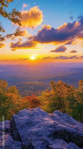 A breathtaking sunset over Mount Greylock with vibrant autumn foliage, capturing nature's serene beauty in the evening glow photo