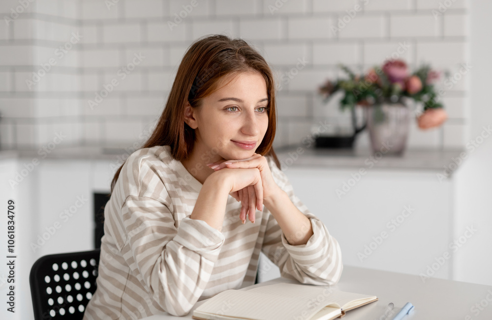 Thoughtful Teenage Girl Smiles At Home At The Table Thoughtful Teenage Girl Smiles At Home At The Table