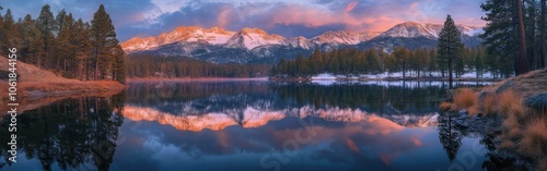 Breathtaking Lake Tahoe sunrise illuminates majestic mountains and tranquil waters with stunning reflections