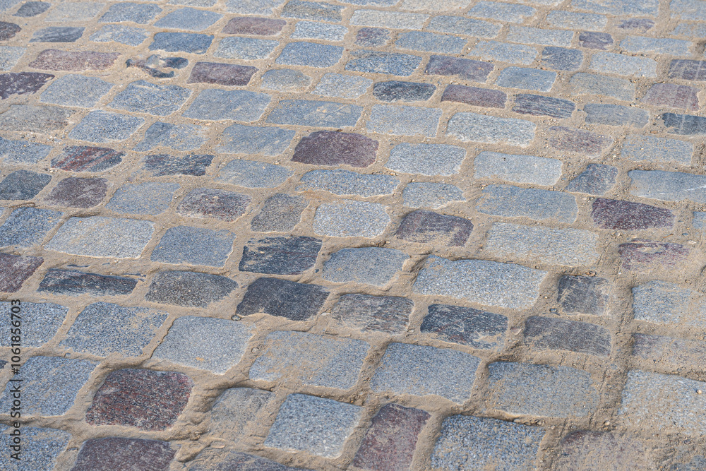 Outdoor floor material. gray rough cobbled road from concrete pavers Outdoor floor material. gray rough cobbled road from concrete pavers