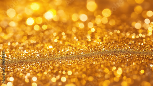 Luminous golden bokeh lights sparkle in warm glowing abstract background