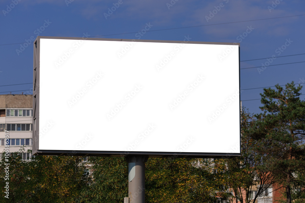 Background for design, white billboards on city streets and along roads in the summer day Background for design, white billboards on city streets and along roads in the summer day