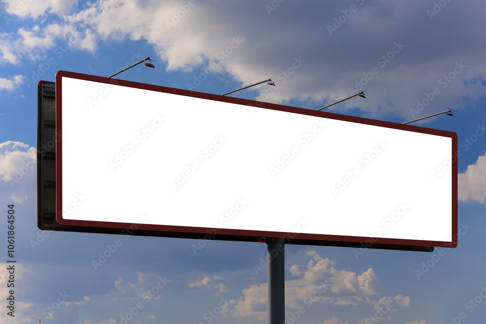 White billboard along the highway. Background for design and advertising. White billboard along the highway. Background for design and advertising.