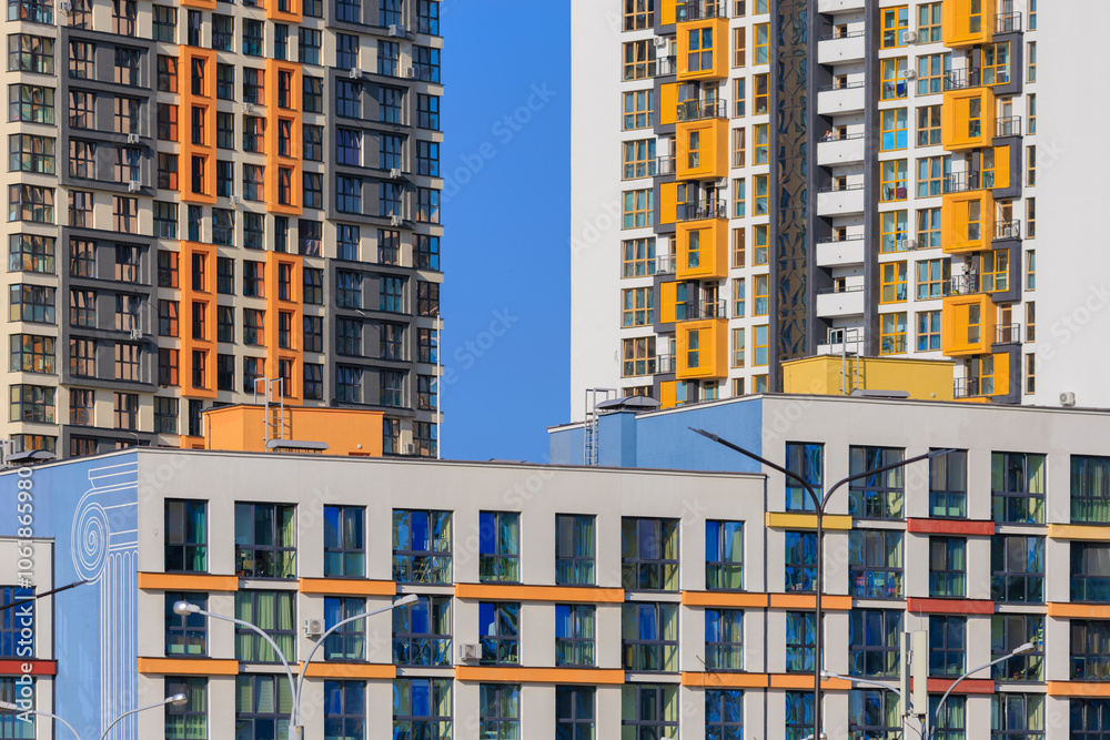 City view, modern buildings and skyscrapers against the blue sky. City view, modern buildings and skyscrapers against the blue sky.