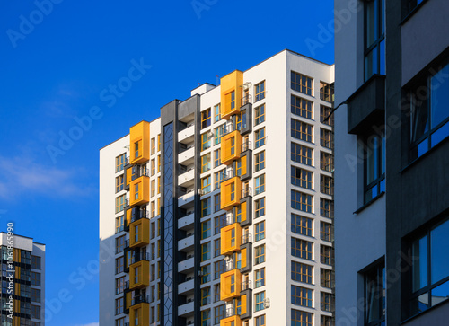 City view, modern buildings and skyscrapers against the blue sky.