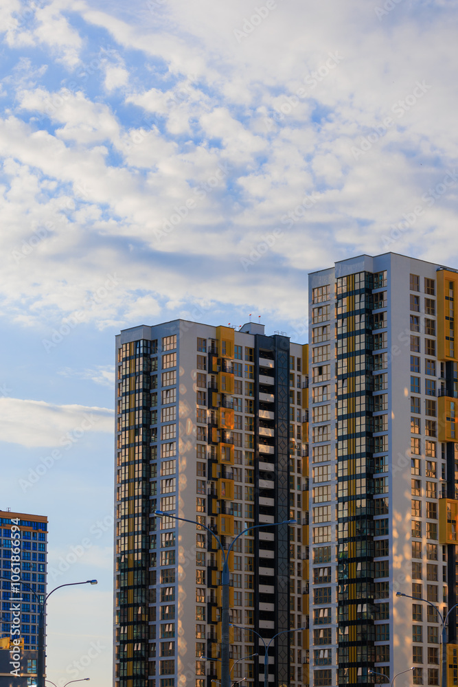 City view, modern buildings and skyscrapers against the blue sky. City view, modern buildings and skyscrapers against the blue sky.