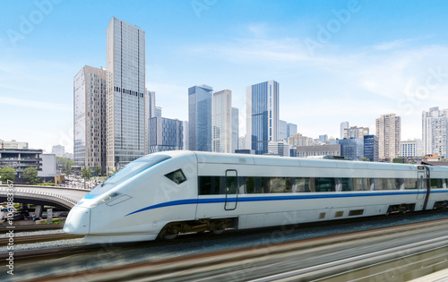 Obraz na płótnie High-speed rail speeds on Bridges and the modern city skyline of chongqing, China w salonie