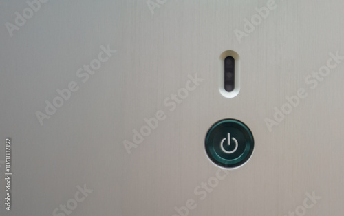On-Off button on stainless steel background