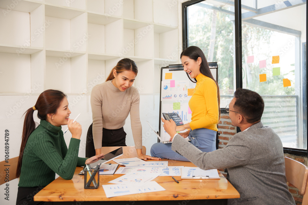 Group of Asian businessmen are sitting in a meeting, talking, exchanging knowledge. Presentation about office work Group of Asian businessmen are sitting in a meeting, talking, exchanging knowledge. Presentation about office work
