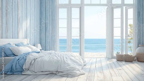 White bed with blue and white linens in a bedroom with blue walls and large windows overlooking the ocean.