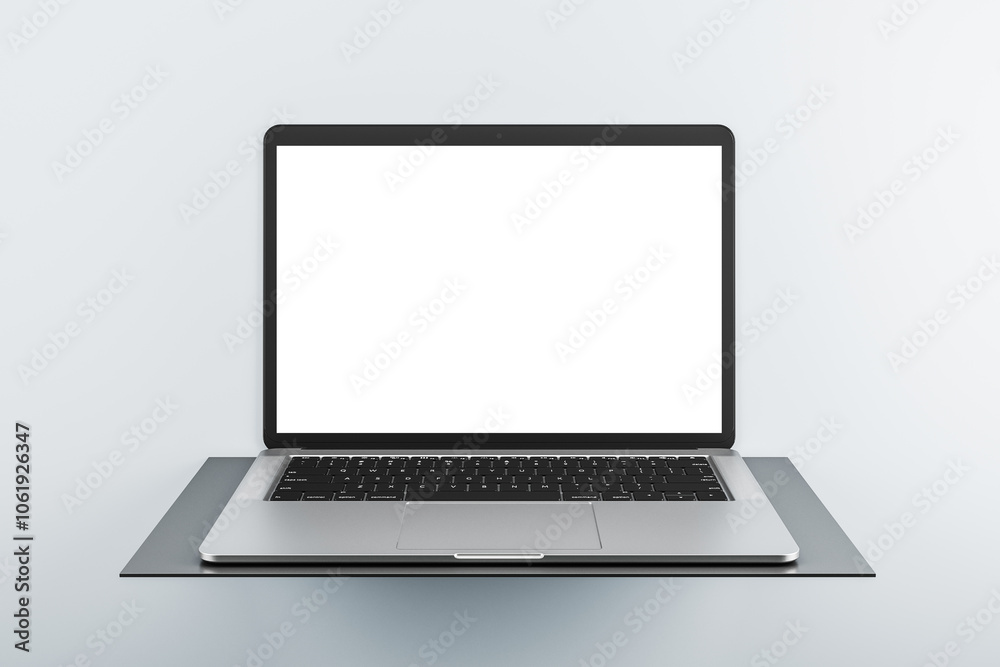 Front view on modern laptop blank white screen with copyspace for your logo or text on dark stand isolated on light background. 3D rendering, mock up Front view on modern laptop blank white screen with copyspace for your logo or text on dark stand isolated on light background. 3D rendering, mock up
