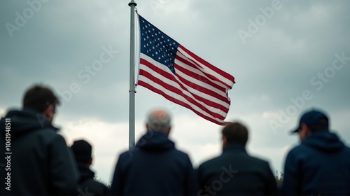 People Standing in Respectful Silence Facing American Flag - A Day to Remember