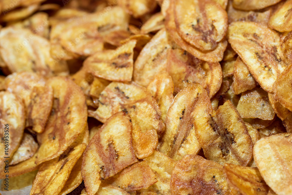 Kerala chips or Banana chips, Honey Baked Banana Slices on white background. Kerala chips or Banana chips, Honey Baked Banana Slices on white background.