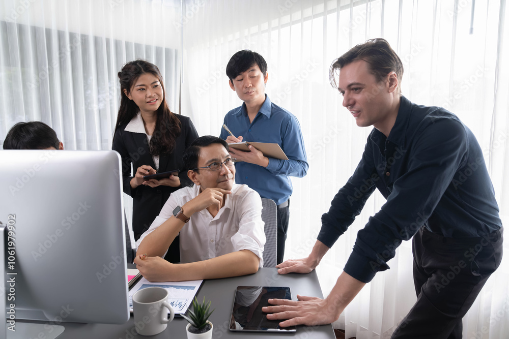 Group of diverse office worker employee working together on strategic business marketing planning in corporate office room. Positive teamwork in business workplace concept. Prudent Group of diverse office worker employee working together on strategic business marketing planning in corporate office room. Positive teamwork in business workplace concept. Prudent