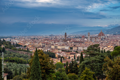 Skyline of Florence, Italy during a cloudy autumn twilight photo