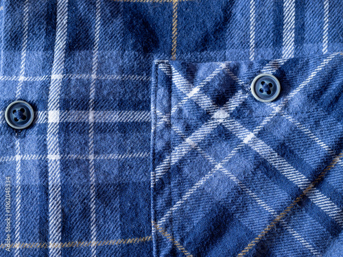 Checkered plaid shirt pattern close up. Blue color.