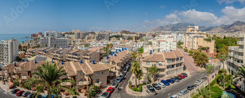aerial view of western part of benalmadena, beach with some buildings	