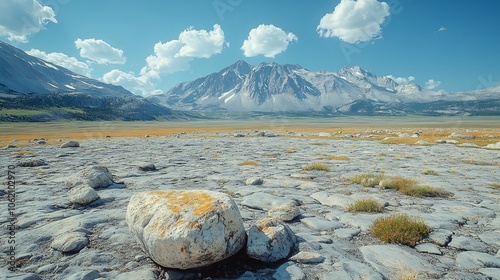 Barren landscape littered glacial boulders showing evidence of past ice movement and glacial retreat during the dynamic climate shifts of the Younger Dryas photo