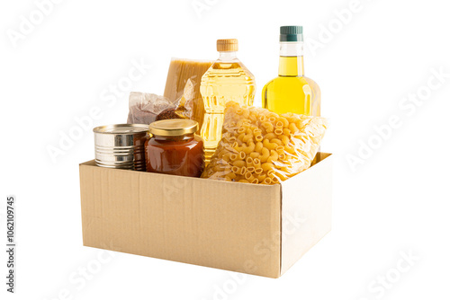 Foodstuff for donation isolated on white background with clipping path, storage and delivery. Various food, pasta, cooking oil and canned food in cardboard box.