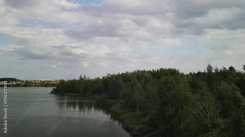 Aerial drone view of the river and green forests, landscape on a summer day Aerial drone view of the river and green forests, landscape on a summer day