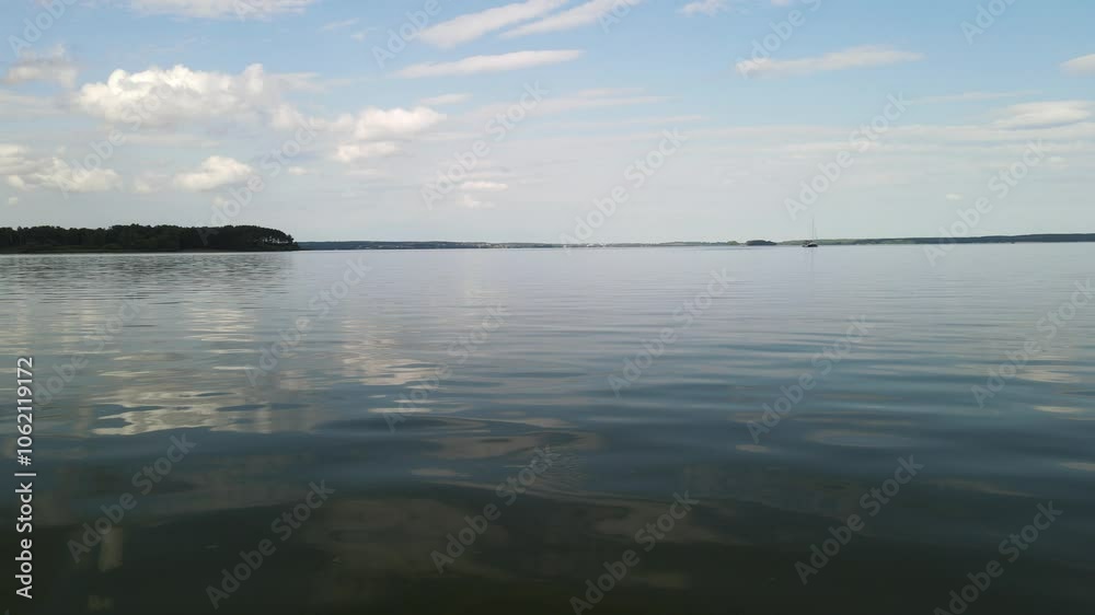 Aerial drone view of the river and green forests, landscape on a summer day