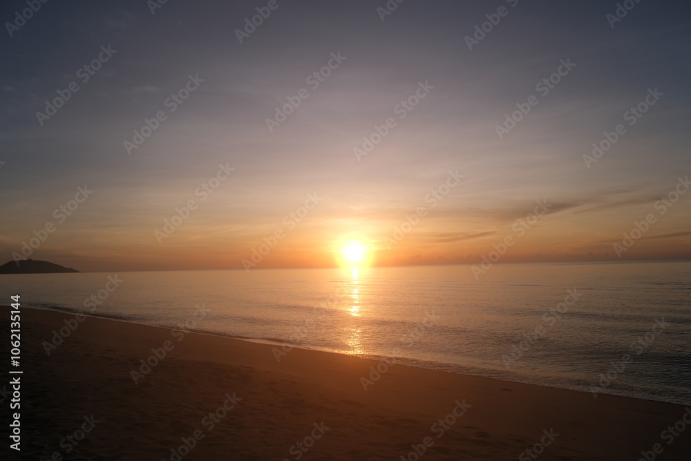 The sun rises at the sea in the morning. The sun rises at the sea in the morning.