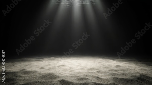 Peaceful ocean floor with subtle contrasts of light and dark, sand and stones settled undisturbed, faint light filtering down, casting soft shadows across the tranquil seabed