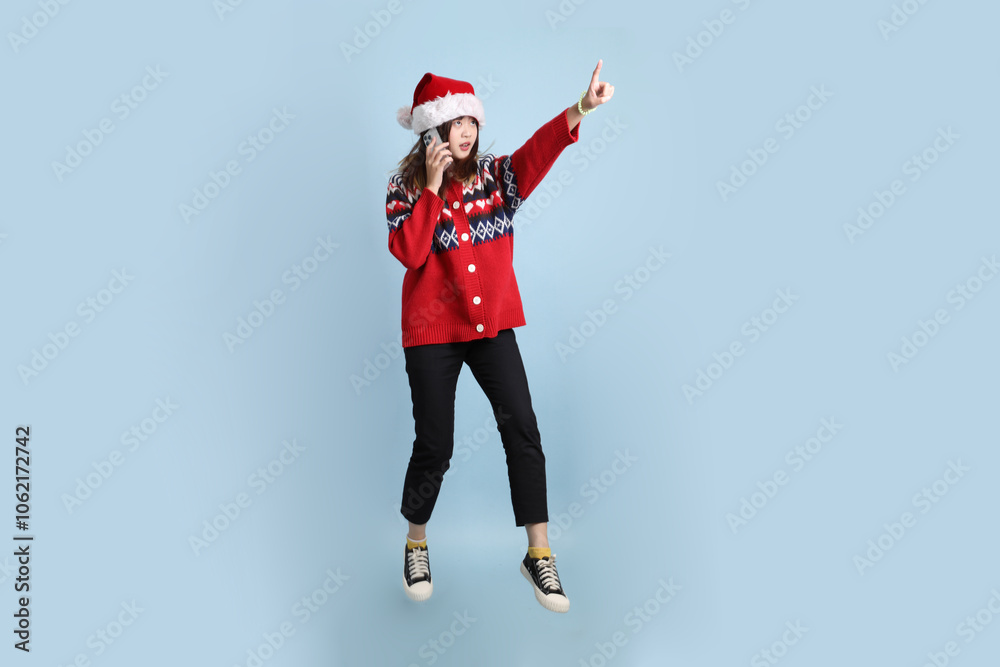 Woman wearing Santa hat Woman wearing Santa hat