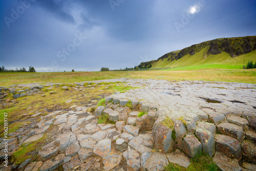 Kirkjugolf basalt stone formations in South Iceland photo