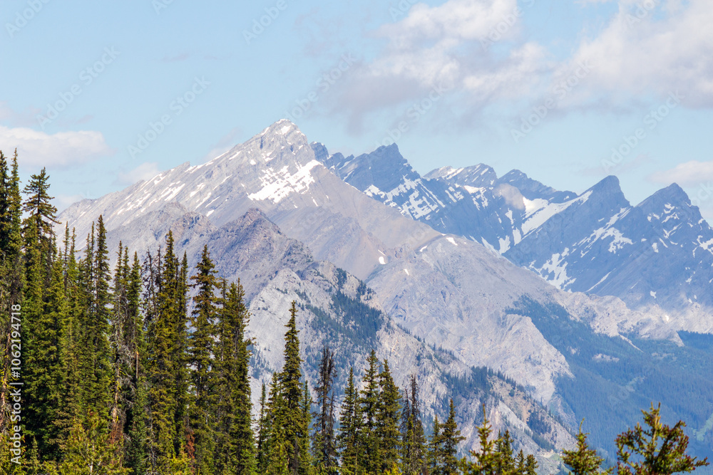 Majestic Mountain Range with Snow-Capped Peaks and Dense Forest Majestic Mountain Range with Snow-Capped Peaks and Dense Forest