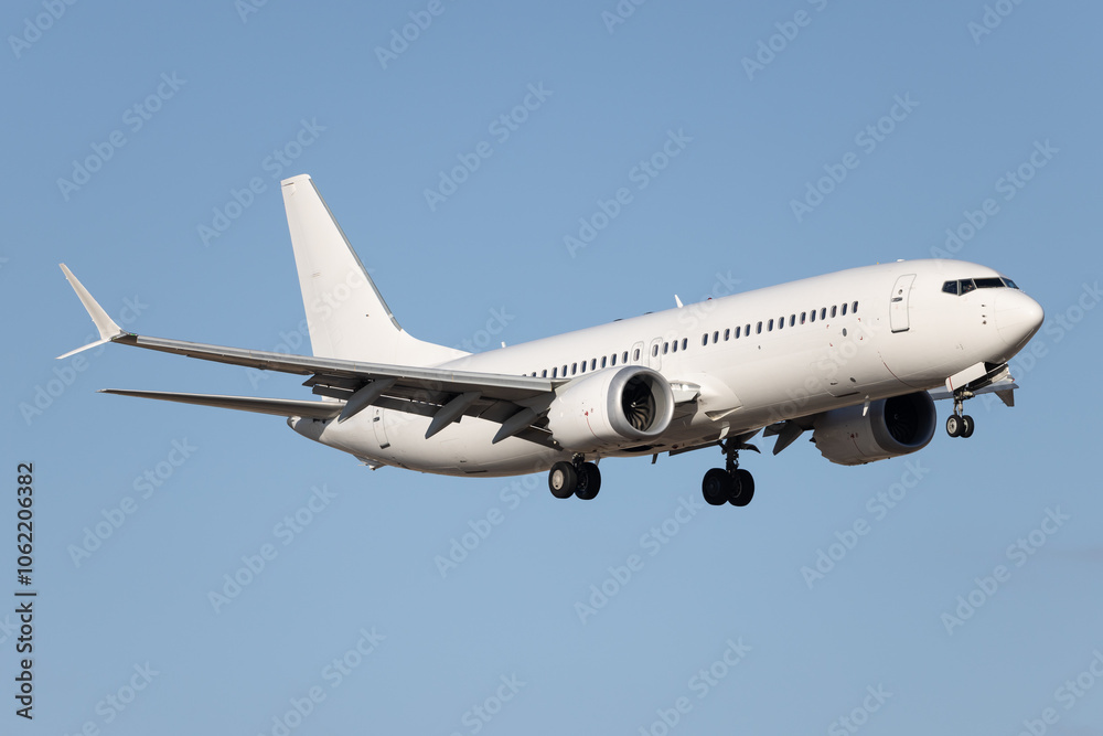 White modern airliner landing at airport. White modern airliner landing at airport.