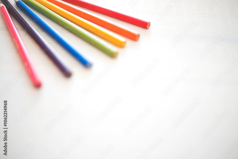 Seven coloured pencils side by side on a white background Seven coloured pencils side by side on a white background