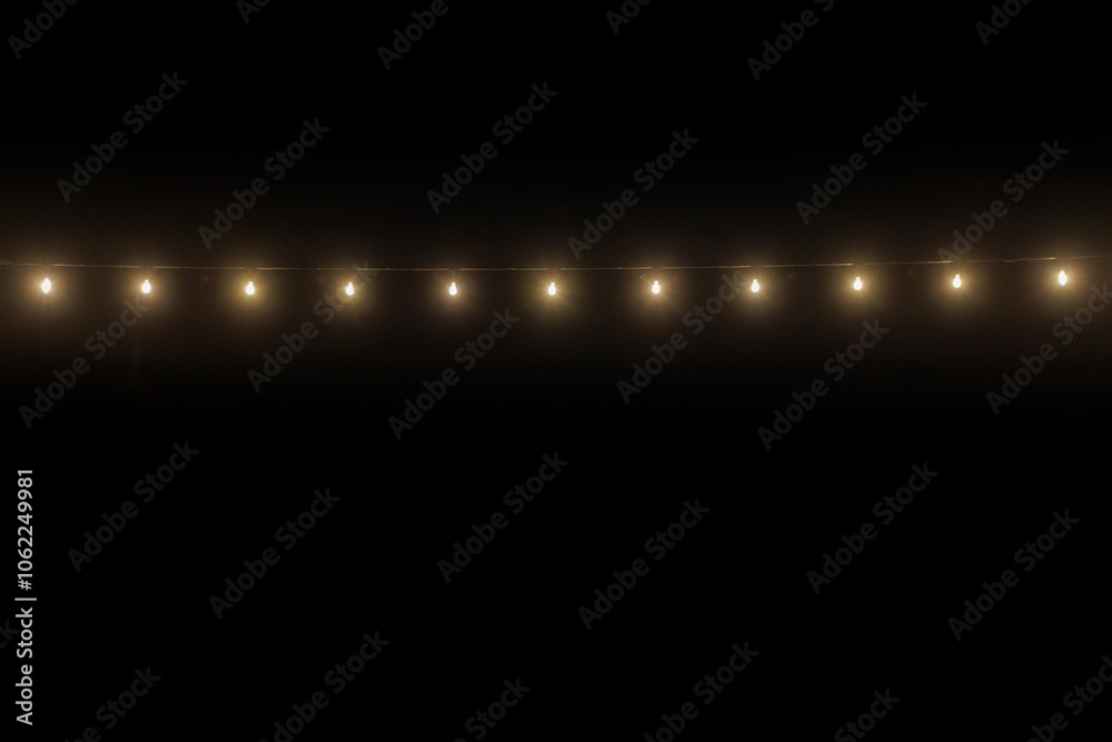 String lights isolated on dark background String lights isolated on dark background
