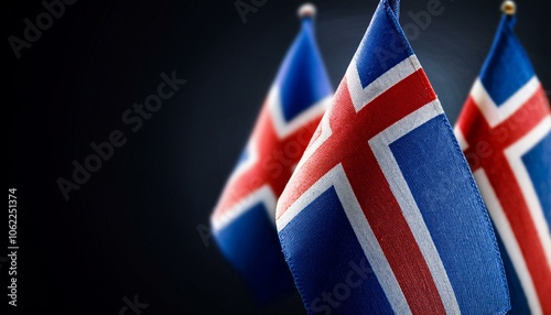 小さなアイスランドの国旗と暗い背景。(Icelandic flag and dark background.) 