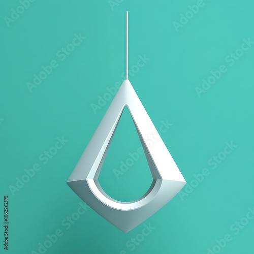 Minimalist Geometric Teardrop Pendant Against Turquoise Background photo