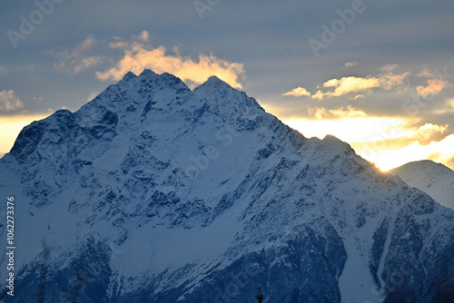 Winter sunrise behind Pioneer Peak in Alaska's Chugach Range. photo