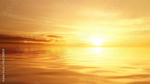 Vibrant sunset with a golden sky and a calm, reflective ocean