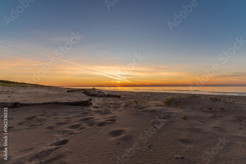 Fototapeta Naklejka Na Ścianę i Meble -  Sunset at Baltic sea beach in Latvia at Autumn