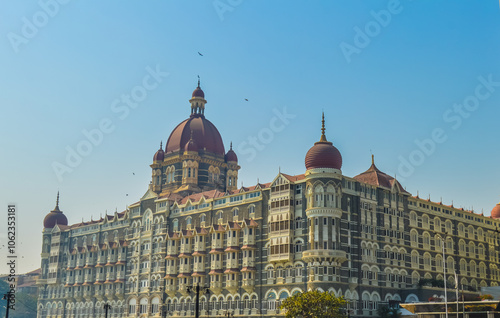 Beautiful Gateway of India near Taj Palace hotel on the Mumbai harbour with many jetties on Arabian sea photo