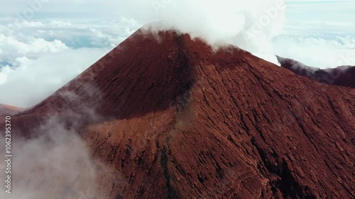 Mount Kerinci is the highest mountain in Sumatra and the highest volcano in Indonesia with an altitude of 3805 masl in the Kerinci Seblat National Park area. Kayu Aro, Kerinci, Jambi, Indonesia, Asia. photo