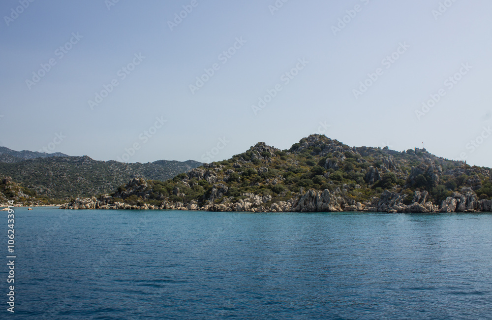 the Mediterranean Sea with rocky boulders off the coast of Turkey the Mediterranean Sea with rocky boulders off the coast of Turkey
